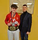 Oskar Drzewiecki z medalami...