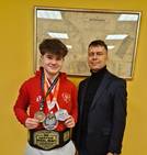 Oskar Drzewiecki z medalami...